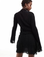 high neck top in black plisse