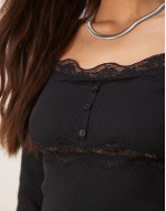 ribbed long sve top with lace and button detail in black
