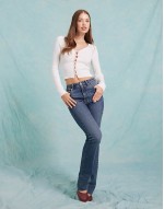 cosy knit rib V neck faux pearl button detail long sve top in cream