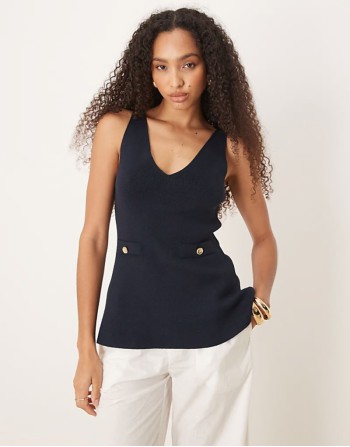 knitted structured peplum top with lapels in navy