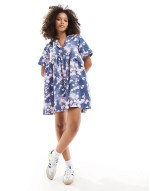 mini shirt dress with revere collar and corset hem in blue abstract print